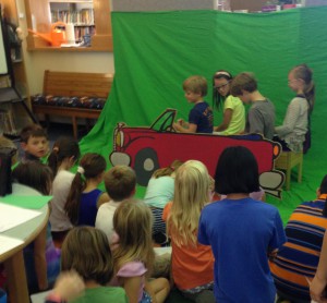 Students using a green screen in class